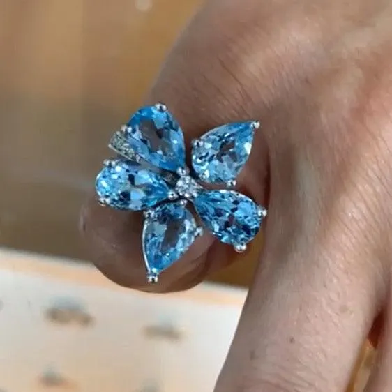 Blue Topaz Pear Flower Ring